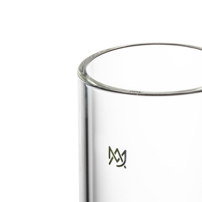 Close-up of MJ Arsenal Piston Gravity Bong showing premium borosilicate glass and logo detail.