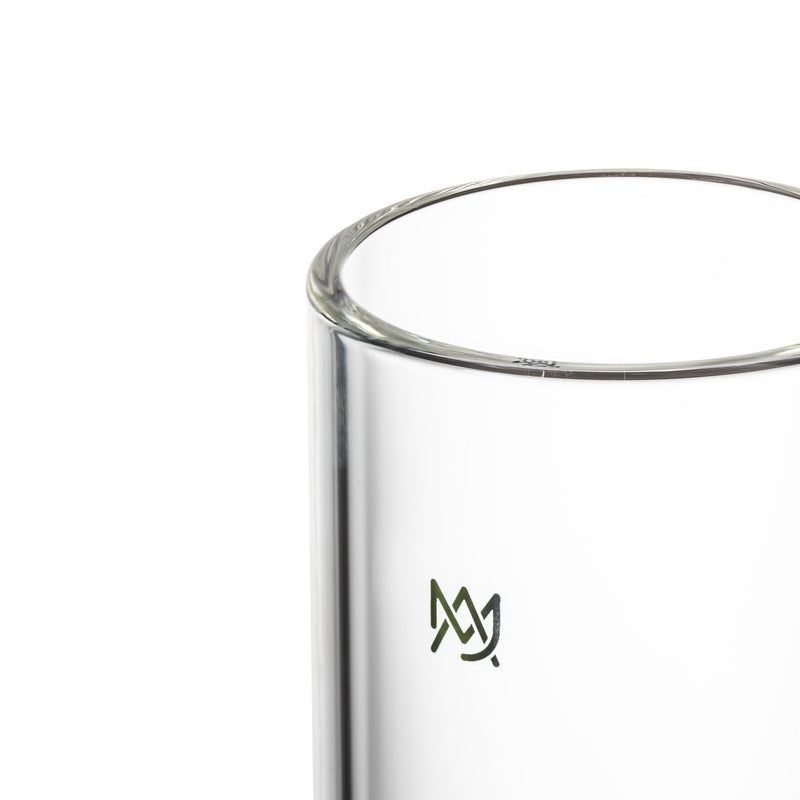 Close-up of MJ Arsenal Piston Gravity Bong showing premium borosilicate glass and logo detail.