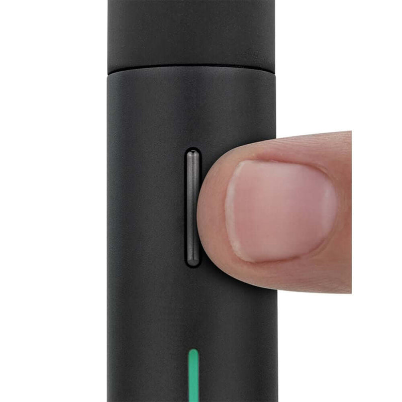 Close-up of Puffco Pivot Concentrate Vaporizer button with finger, highlighting sleek design and user-friendly interface.