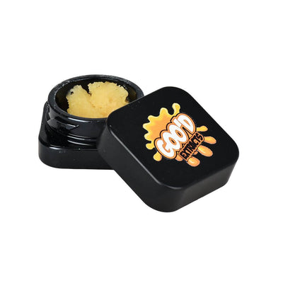 GOO'D Premium THCA Concentrate in black container, showcasing a yellow, terpene-enhanced concentrate for dabbing or mixing.