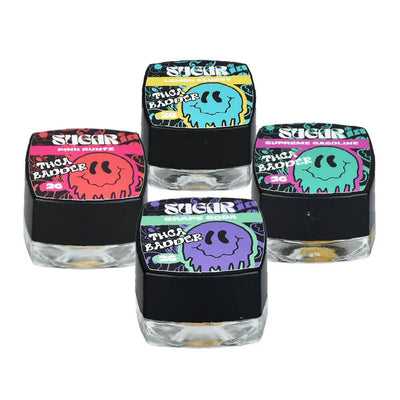 Four colorful containers of Sugar THCA Badder, showcasing different flavors and high-quality cannabis extract.