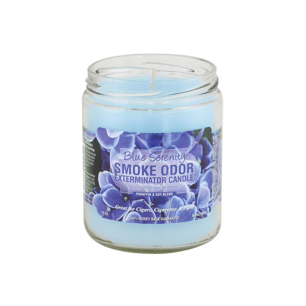 Blue Serenity Smoke Odor Exterminator candle in a jar, effective for eliminating smoke odors and filling space with fragrance.