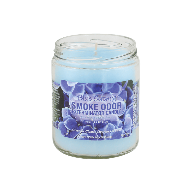 Blue Serenity Smoke Odor Exterminator candle in a jar, effective for eliminating smoke odors and filling space with fragrance.