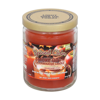 Spiced Cider Smoke Odor Exterminator Candle in jar, designed to neutralize smoke odors with a pleasant fragrance.