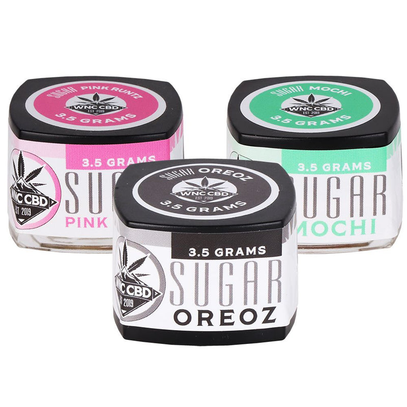 WNC CBD THCA Sugar jars featuring Pink Runt, Orez, and Mochi flavors in 3.5 grams packaging.