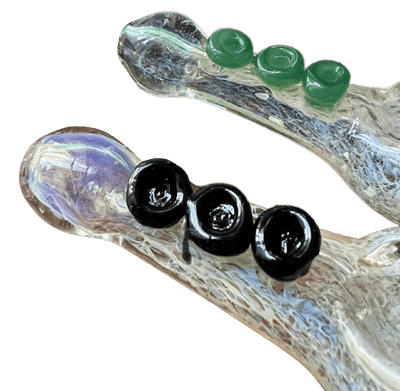 4" handblown glass pipe featuring color-changing silver fumed frit and marble accents, perfect for any collector.
