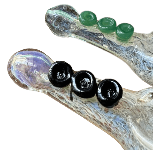 4" handblown glass pipe featuring color-changing silver fumed frit and marble accents, perfect for any collector.