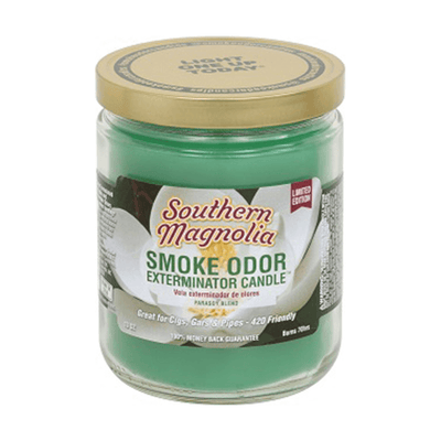 Southern Magnolia Smoke Odor Exterminator candle in a jar, ideal for eliminating smoke odors with a pleasant fragrance.