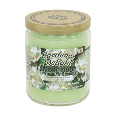 Gardenia Delight Smoke Odor Exterminator candle in a glass jar, perfect for eliminating smoke odors and adding pleasant fragrance.