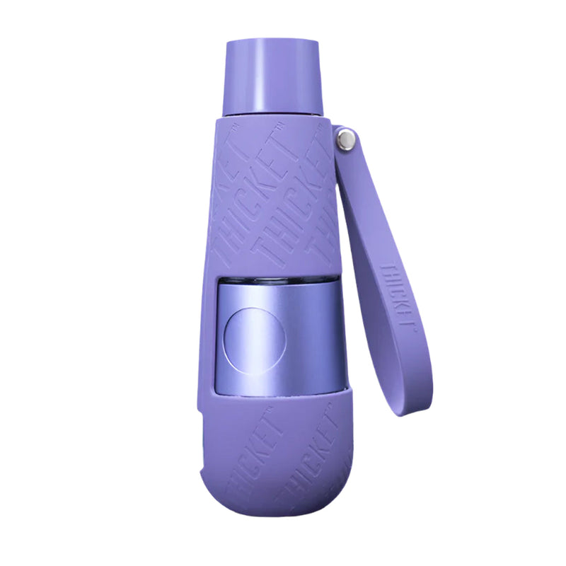 Thicket V2 Water Pipe in purple, portable and sleek design with durable silicone sleeve for discreet smoking.