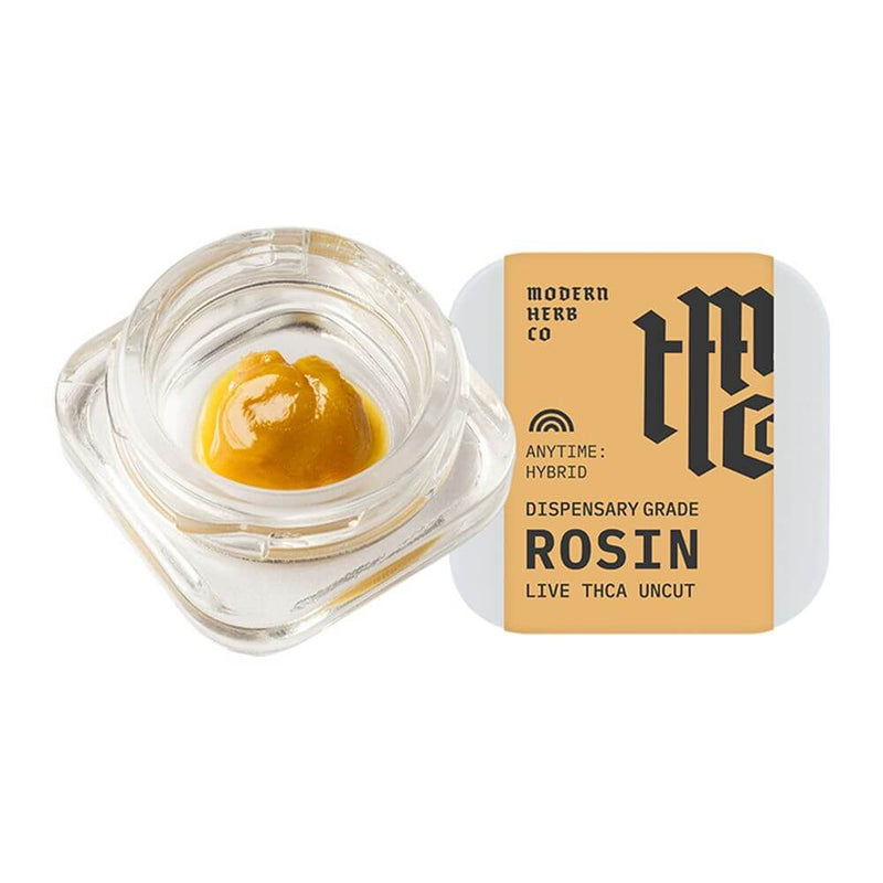 Dispensary grade live rosin THCA uncut dabs in glass container by Modern Herb Co, hybrid strain.
