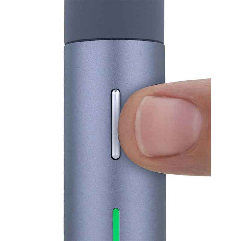 Puffco Pivot Concentrate Vaporizer with a finger pressing the control button for optimal vaping experience.