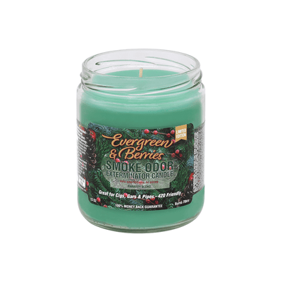 Evergreen & Berries Smoke Odor Exterminator candle in a glass jar, designed to neutralize smoke odors with a pleasant fragrance.