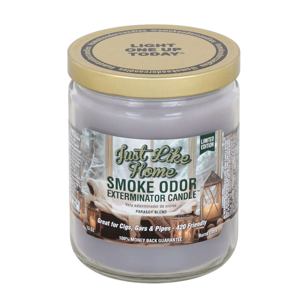 Just Like Home Smoke Odor Exterminator candle in a glass jar, perfect for eliminating smoke odors from cigars, cigarettes, and pipes.
