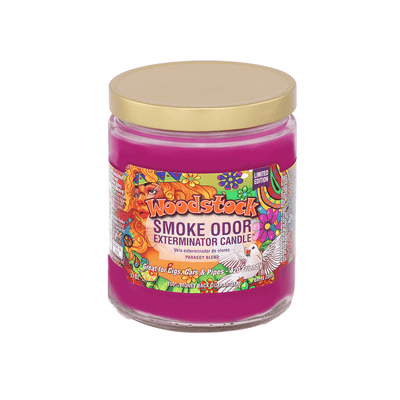 Woodstock Smoke Odor Exterminator Candle in pink jar with floral design, perfect for neutralizing smoke odors.