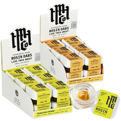 Modern Herb Co live rosin dabs in display box, featuring Tropicana Cherry and Kosher Kush flavors, highlighting THCA potency.