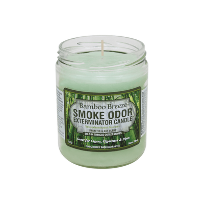 Bamboo Breeze Smoke Odor Exterminator Candle in a jar, designed to neutralize and eliminate smoke odors.
