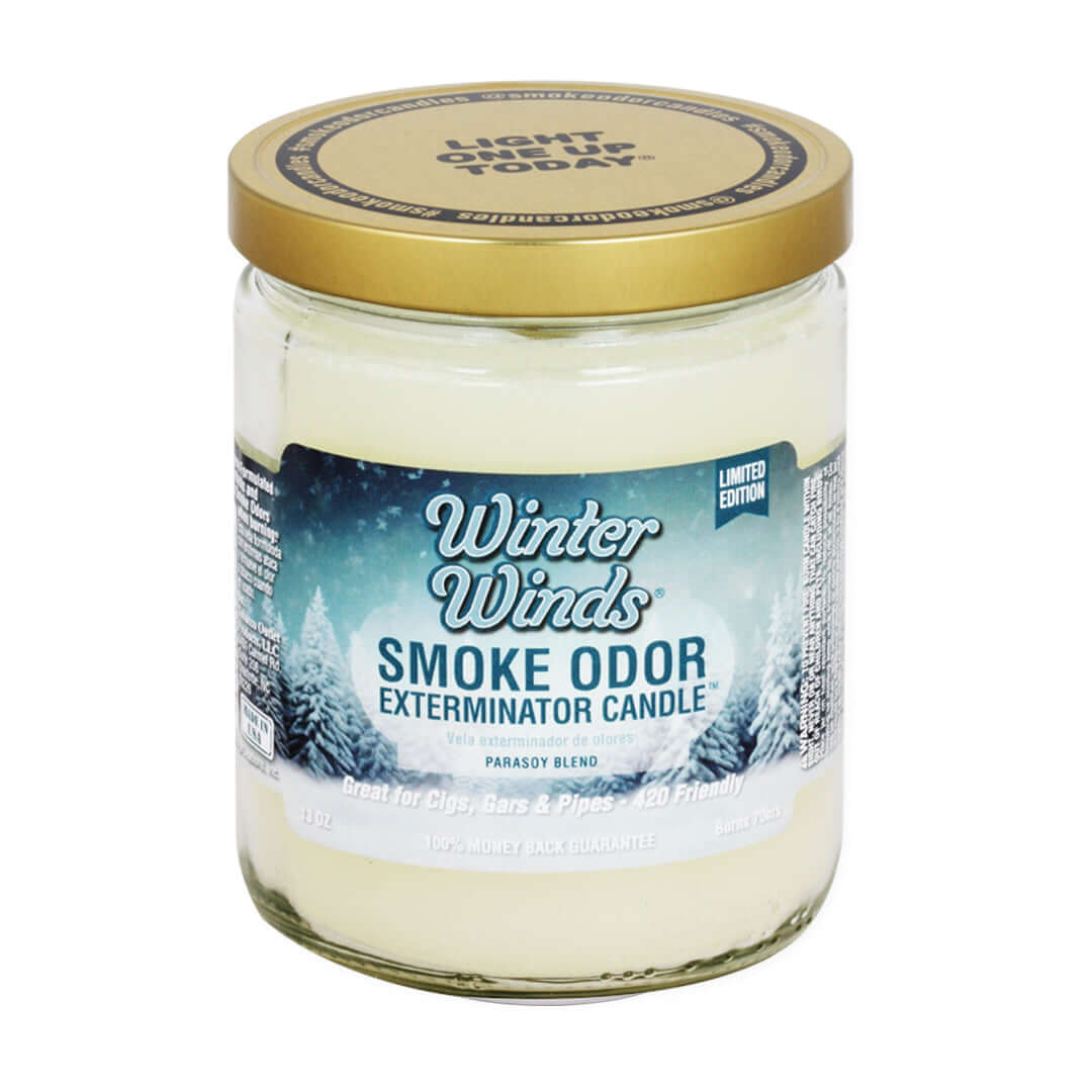 Winter Winds Smoke Odor Exterminator Candle in glass jar, effectively neutralizing smoke odors with a pleasant fragrance.