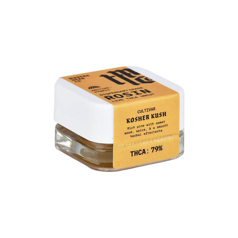 Kosher Kush live rosin in a glass jar with an orange label highlighting 79% THCA, showcasing premium dabbing product.